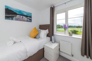 Posedenie v ubytovaní Greenfield's Oxlade Home - Modern 3 Bed room House, Langley, Slough