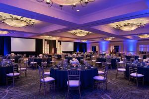 a ballroom with tables and chairs in a room at Hyatt Regency Westlake in Westlake Village +39 photos