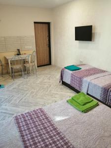 Cama o camas de una habitación en Guest House Kamysh