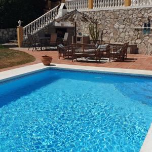 Swimmingpoolen hos eller tæt på La Casa de la Palmeras