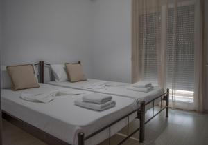 Posteľ alebo postele v izbe v ubytovaní Marion Apartments
