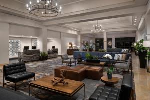 a lobby of a hotel with couches and chairs at Hyatt Regency Westlake in Westlake Village