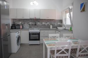 Kuchyňa alebo kuchynka v ubytovaní Marion Apartments