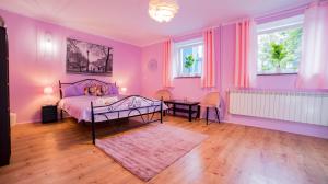 Posteľ alebo postele v izbe v ubytovaní Apartamenty Niebo