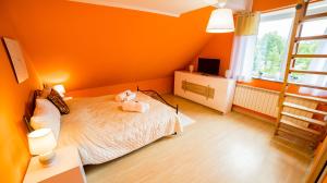 Posteľ alebo postele v izbe v ubytovaní Apartamenty Niebo