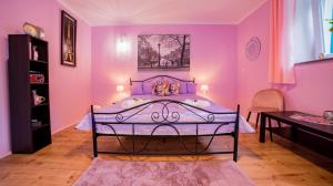 Posteľ alebo postele v izbe v ubytovaní Apartamenty Niebo