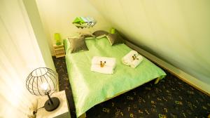 Posteľ alebo postele v izbe v ubytovaní Apartamenty Niebo