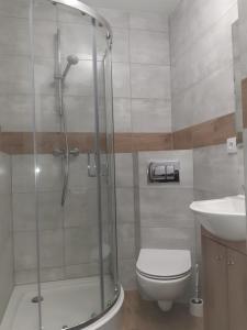 Kúpeľňa v ubytovaní APARTAMENTY CENTRUM PIŁSUDSKIEGO
