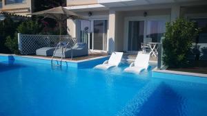 Fotografie z fotogalerie ubytování Paralia Luxury Suites v destinaci Agios Stefanos