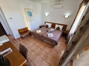 Postel nebo postele na pokoji v ubytování Metropole Hotel + 37 fotografií