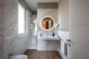 Koupelna v ubytování Hotel Della Piana + 37 fotografií