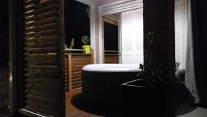 Un baño de Charmant F2 classé, belle vue mer, spa, piscine, bateau