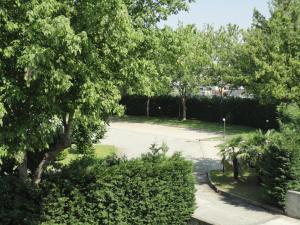 an overhead view of a park with trees and a driveway at Hotel Vazzana in Volpiano