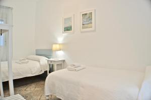 Ein Bett oder Betten in einem Zimmer der Unterkunft Gran apartamento en San Bartolomé
