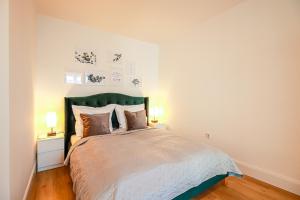 Postel nebo postele na pokoji v ubytování Löwe Apartment Grün Küssaberg am Rhein