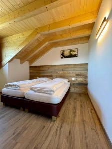 A bed or beds in a room at Sartu Apartments
