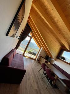 A television and/or entertainment centre at Sartu Apartments