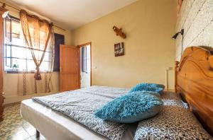 Łóżko lub łóżka w pokoju w obiekcie Apartment La Gomera II