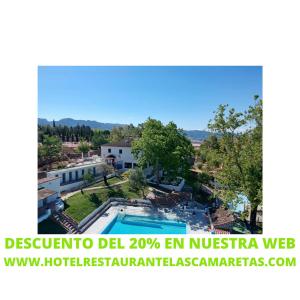 コルテス・デ・ラ・フロンテラにあるHotel Rural & Restaurante Las Camaretasのスイミングプール付きヴィラのイメージ