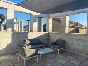 Posedenie v ubytovaní Charming studio next to Fiera with Terrace and parking