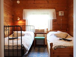 Кровать или кровати в номере Holiday home DALS-LÅNGED