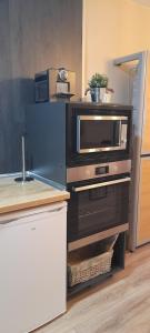 A kitchen or kitchenette at Apartamento El sarrio