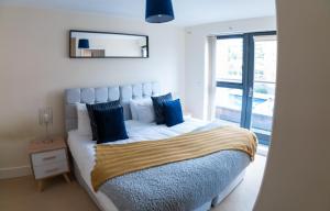 Cama ou camas em um quarto em Moda Stays - Bell Barn House
