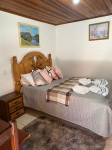 Cama ou camas em um quarto em Pousada Vale Verde