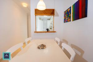 Posteľ alebo postele v izbe v ubytovaní Maria Rosa Urban & Beach Apartment