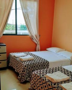 Tempat tidur dalam kamar di Suites Sonikikos