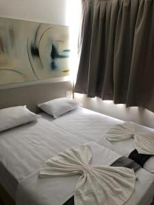 Postel nebo postele na pokoji v ubytování Evian Thermas - Caldas Novas + 17 fotografií