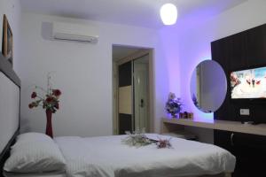 Ένα ή περισσότερα κρεβάτια σε δωμάτιο στο Volkii Hotel +21 φωτογραφίες
