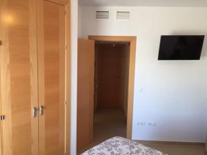 Telewizja i/lub zestaw kina domowego w obiekcie Costa del Algarve