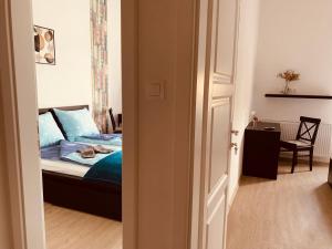 Posteľ alebo postele v izbe v ubytovaní West Residence