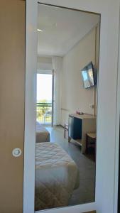 Postel nebo postele na pokoji v ubytování Hotel Internazionale