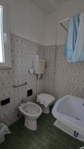 Koupelna v ubytování Hotel Internazionale + 37 fotografií