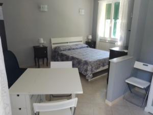 Postel nebo postele na pokoji v ubytování B&B LA LANTERNA