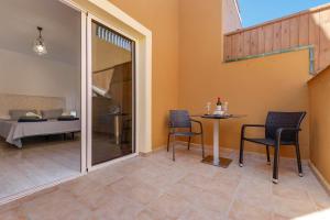 Balkon lub taras w obiekcie Villa Tucanes
