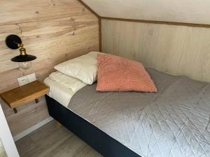 Posteľ alebo postele v izbe v ubytovaní Magic Home Łeba
