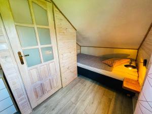 Posteľ alebo postele v izbe v ubytovaní Magic Home Łeba