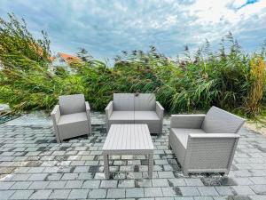 Posedenie v ubytovaní Magic Home Łeba