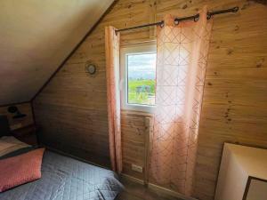 Posteľ alebo postele v izbe v ubytovaní Magic Home Łeba