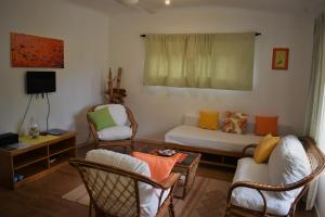 Χώρος καθιστικού στο Sunbird Bungalow