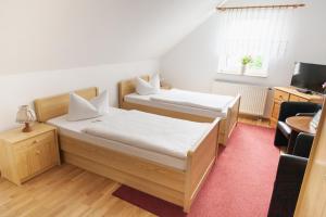 Ένα ή περισσότερα κρεβάτια σε δωμάτιο στο Hotel Klostergarten