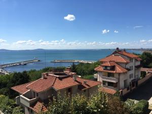 a building with a view of the water at Relax Sarafovo in Burgas