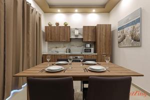 Kuhinja oz. manjša kuhinja v nastanitvi Gem Beachfront Apt with Amazing Bay and Sea Views