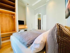 Un pat sau paturi într-o cameră la Strandvilla Charlotte Binz
