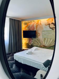 Posteľ alebo postele v izbe v ubytovaní Aparthotel Etna