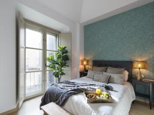Posteľ alebo postele v izbe v ubytovaní Old City Center Penthouse