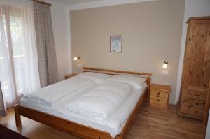 Postel nebo postele na pokoji v ubytování Haus Christine